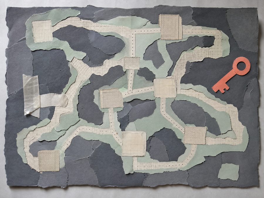 Paper collage map of interconnected cave corridors with a coral key shape